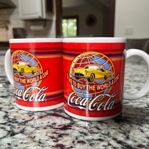 Set of Coca cola “ I’d like to buy the world a coke” coffee mugs.